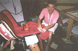 man working on chair
